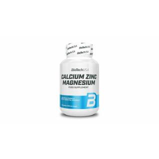 Förpackning med 12 burkar kalcium zink magnesium vitaminer Biotech USA - 100 Comp